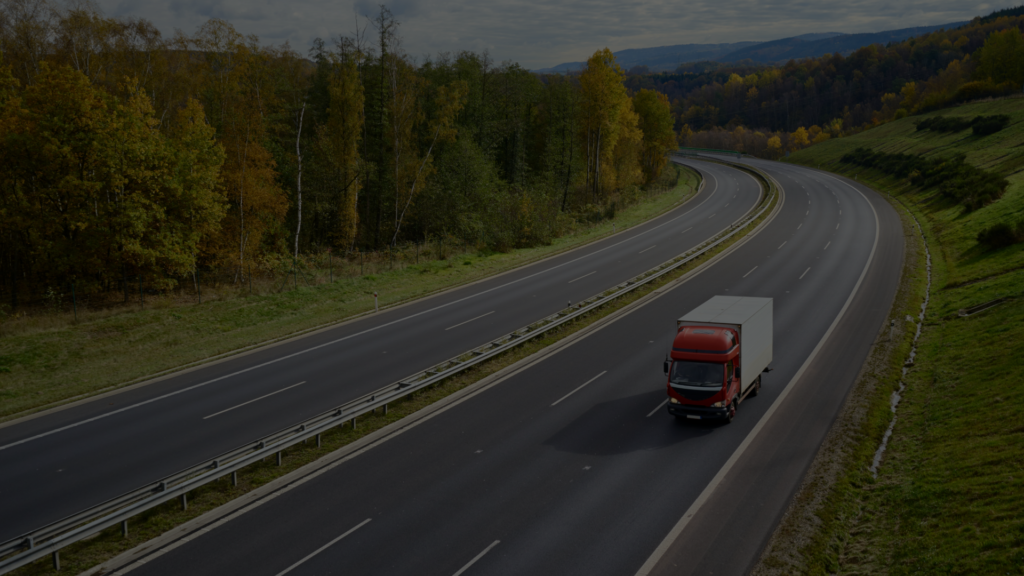 Class 2 lorry driving on a UK road