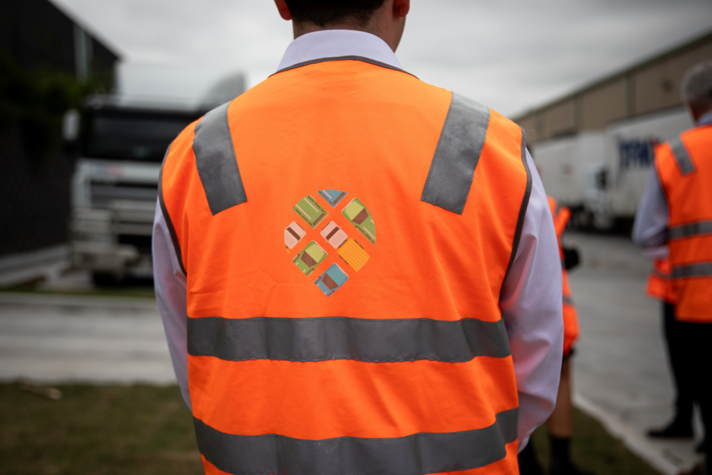 Logistics worker in a DROPP hi-vis vest on a UK site